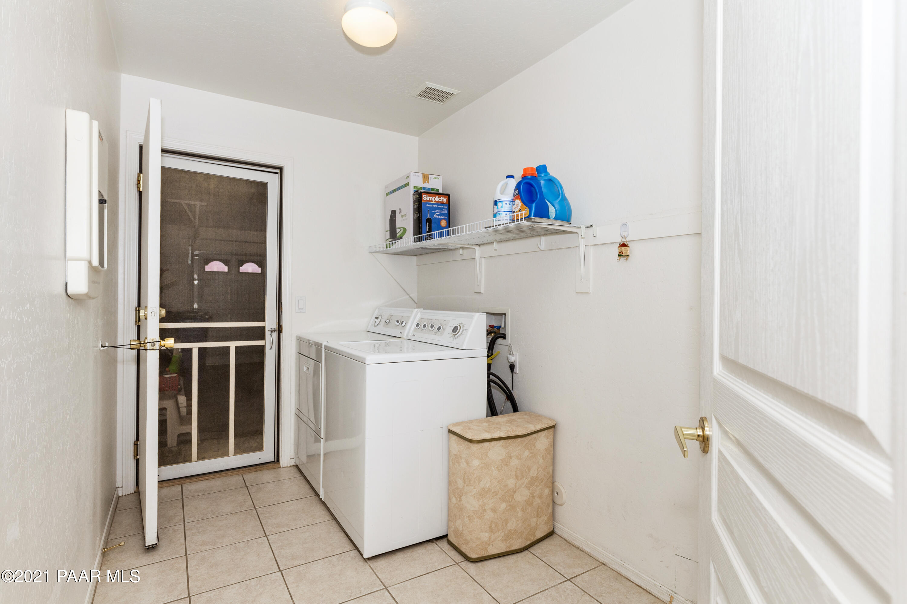 1654 St Andrews Way Prescott, AZ 86301 - Photo 18 of 29 a utility room with dryer and washer