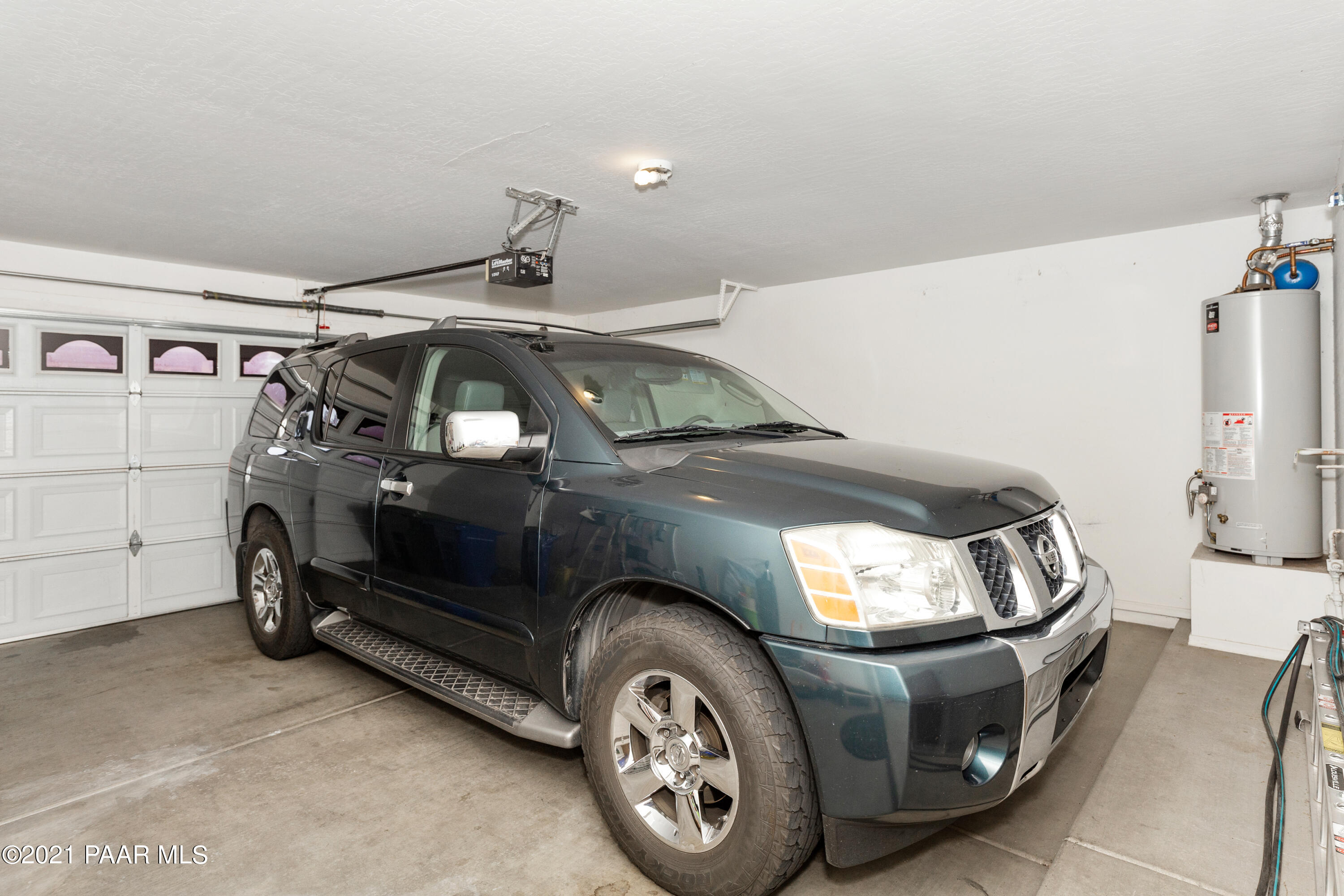 1654 St Andrews Way Prescott, AZ 86301 - Photo 19 of 29 a car parked in a garage