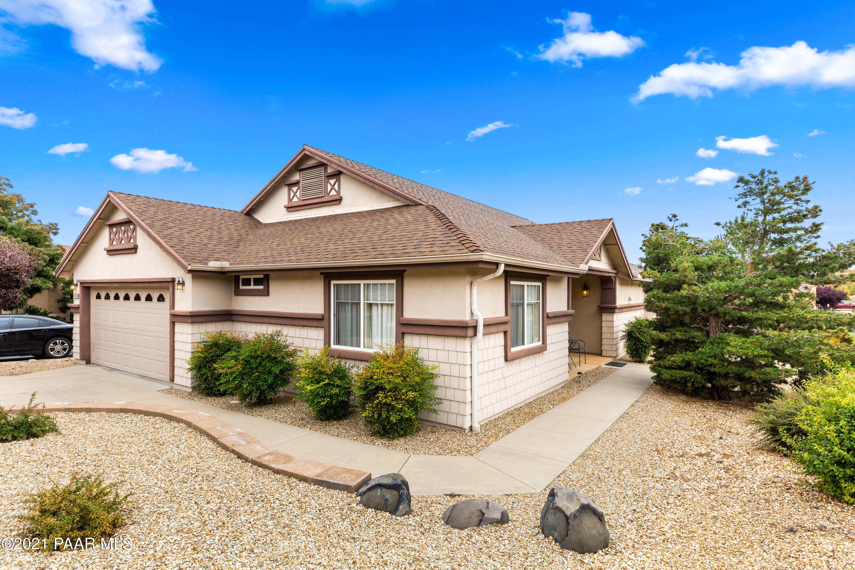 1654 St Andrews Way Prescott, AZ 86301 - Photo 2 of 29 a front view of a house with a yard