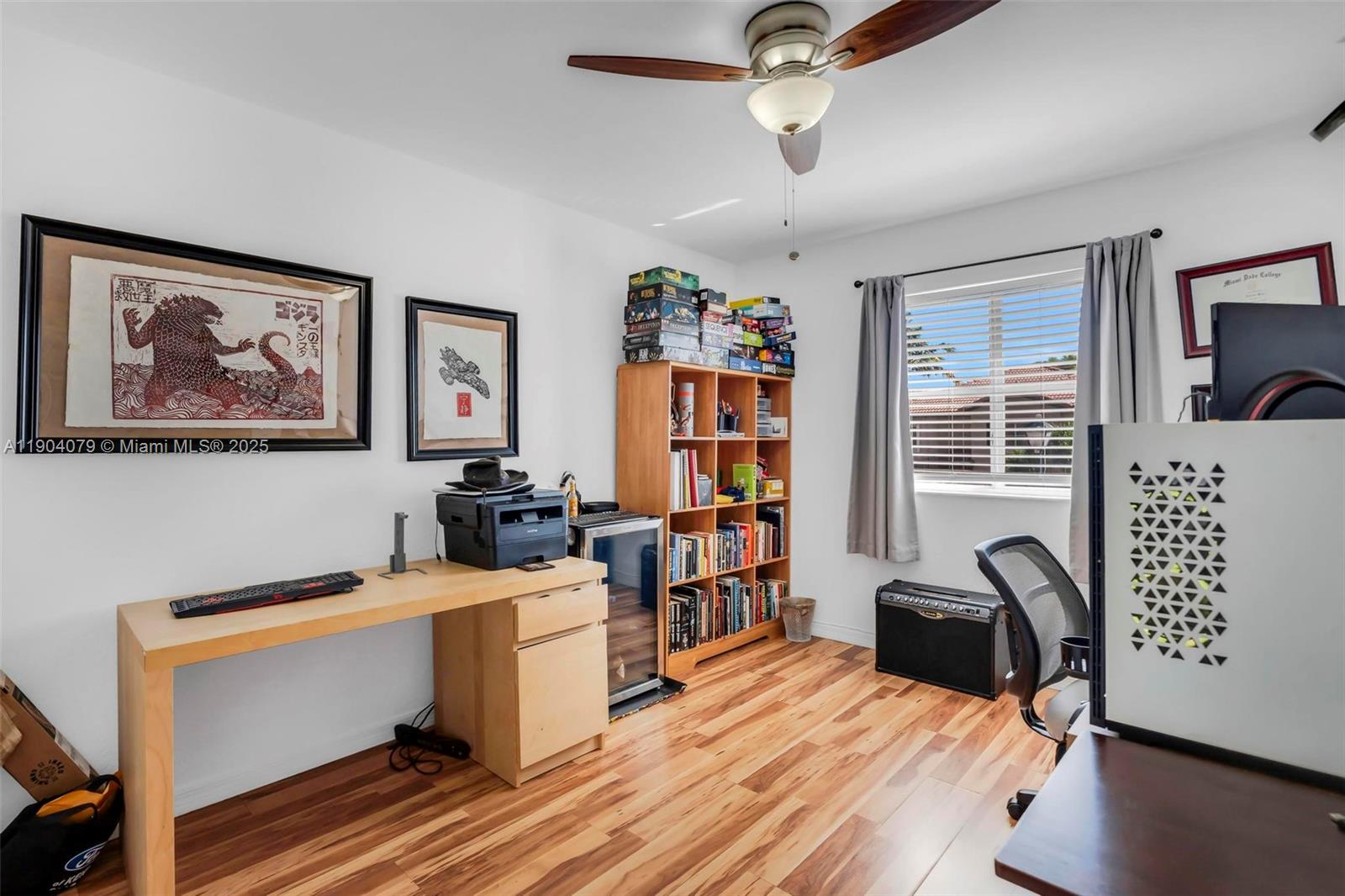 22232 Southwest 88th Path Cutler Bay, FL 33190 - Photo 28 of 72 a view of a workspace with furniture and lounge chair