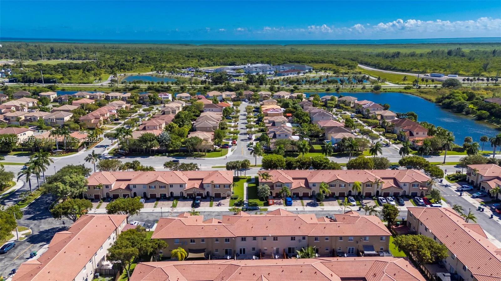 22232 Southwest 88th Path Cutler Bay, FL 33190 - Photo 41 of 72 an aerial view of residential houses with outdoor space