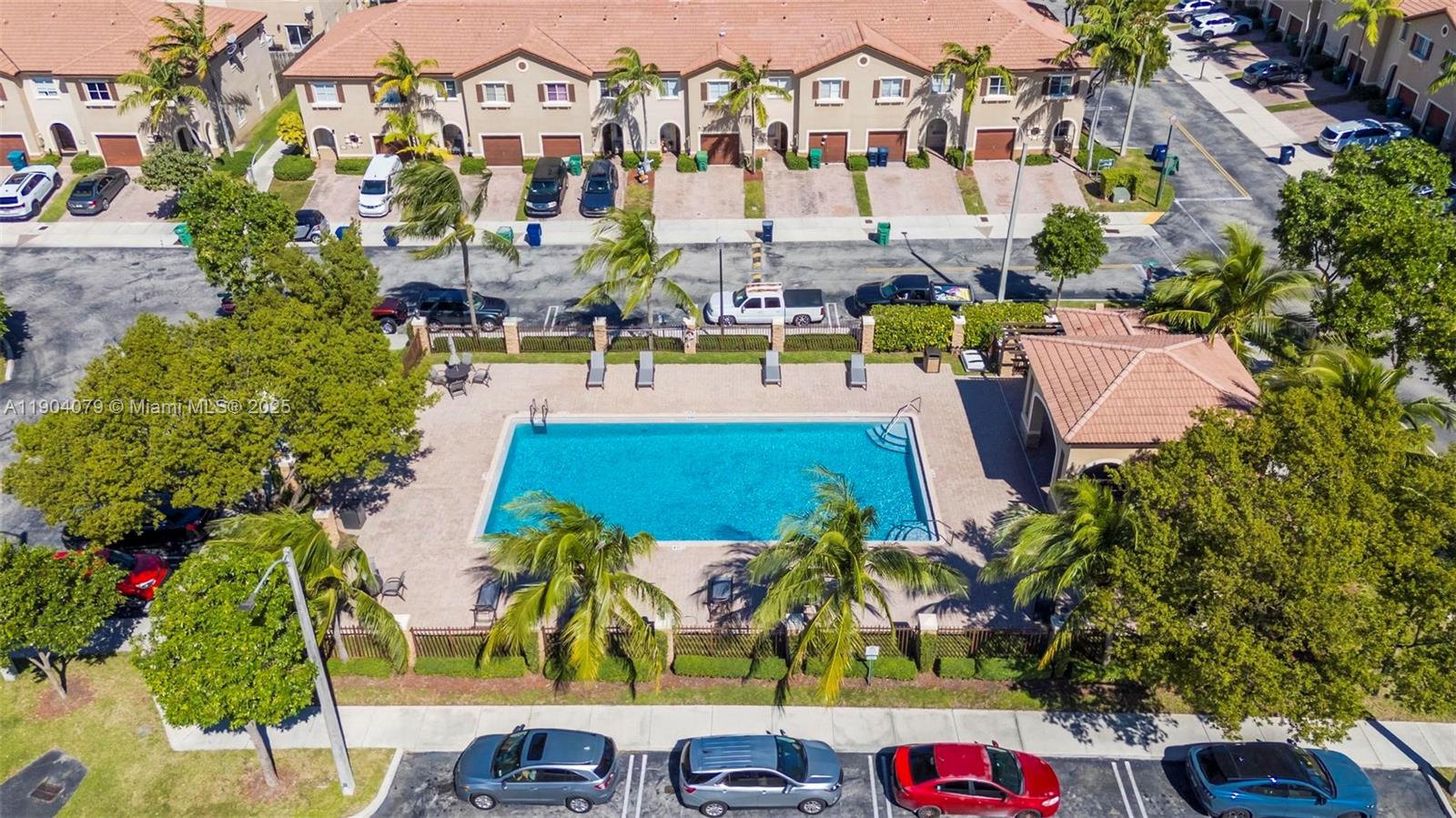 22232 Southwest 88th Path Cutler Bay, FL 33190 - Photo 46 of 72 an aerial view of residential houses with outdoor space and swimming pool