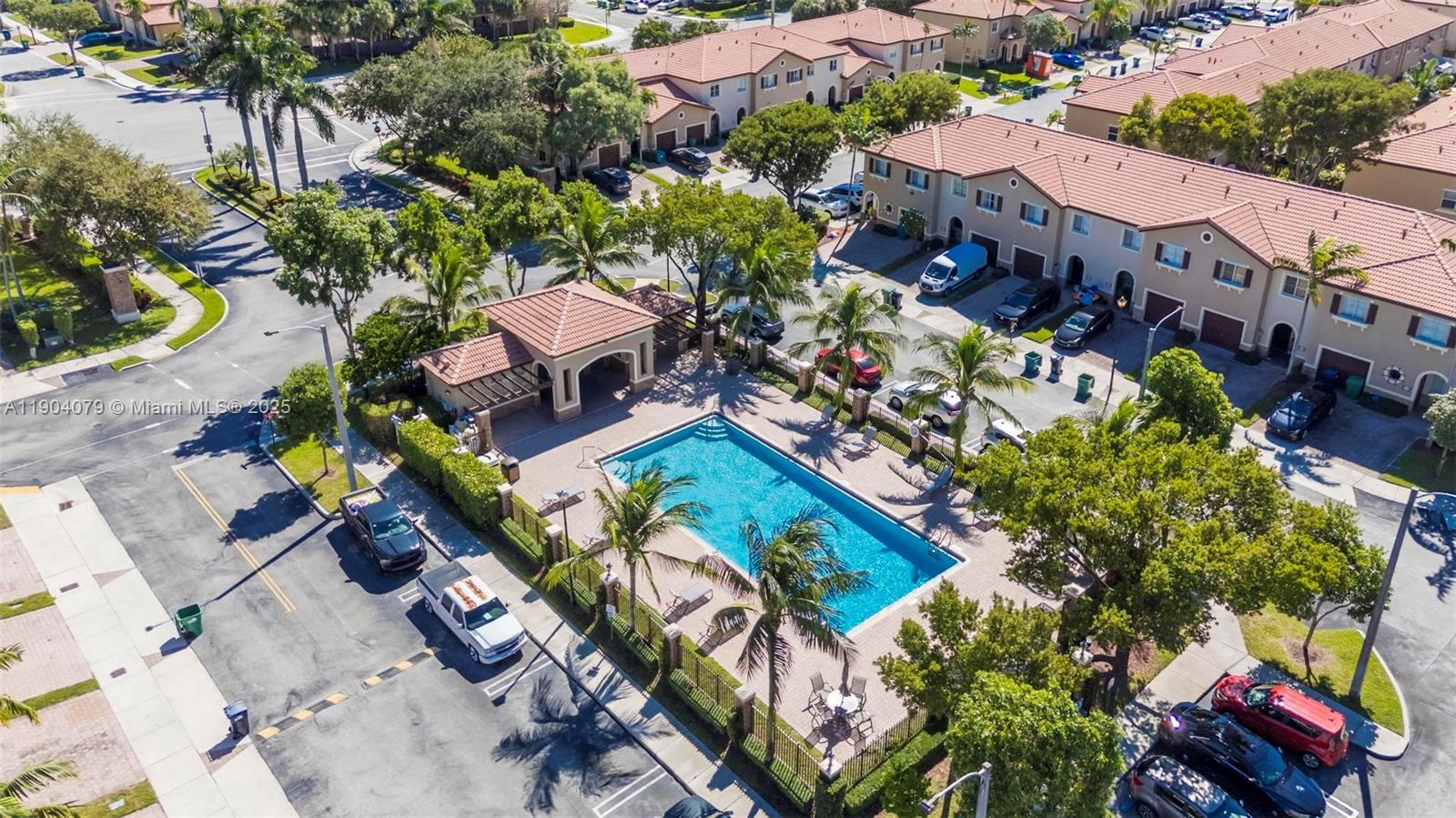 22232 Southwest 88th Path Cutler Bay, FL 33190 - Photo 48 of 72 an aerial view of a house with a garden and swimming pool
