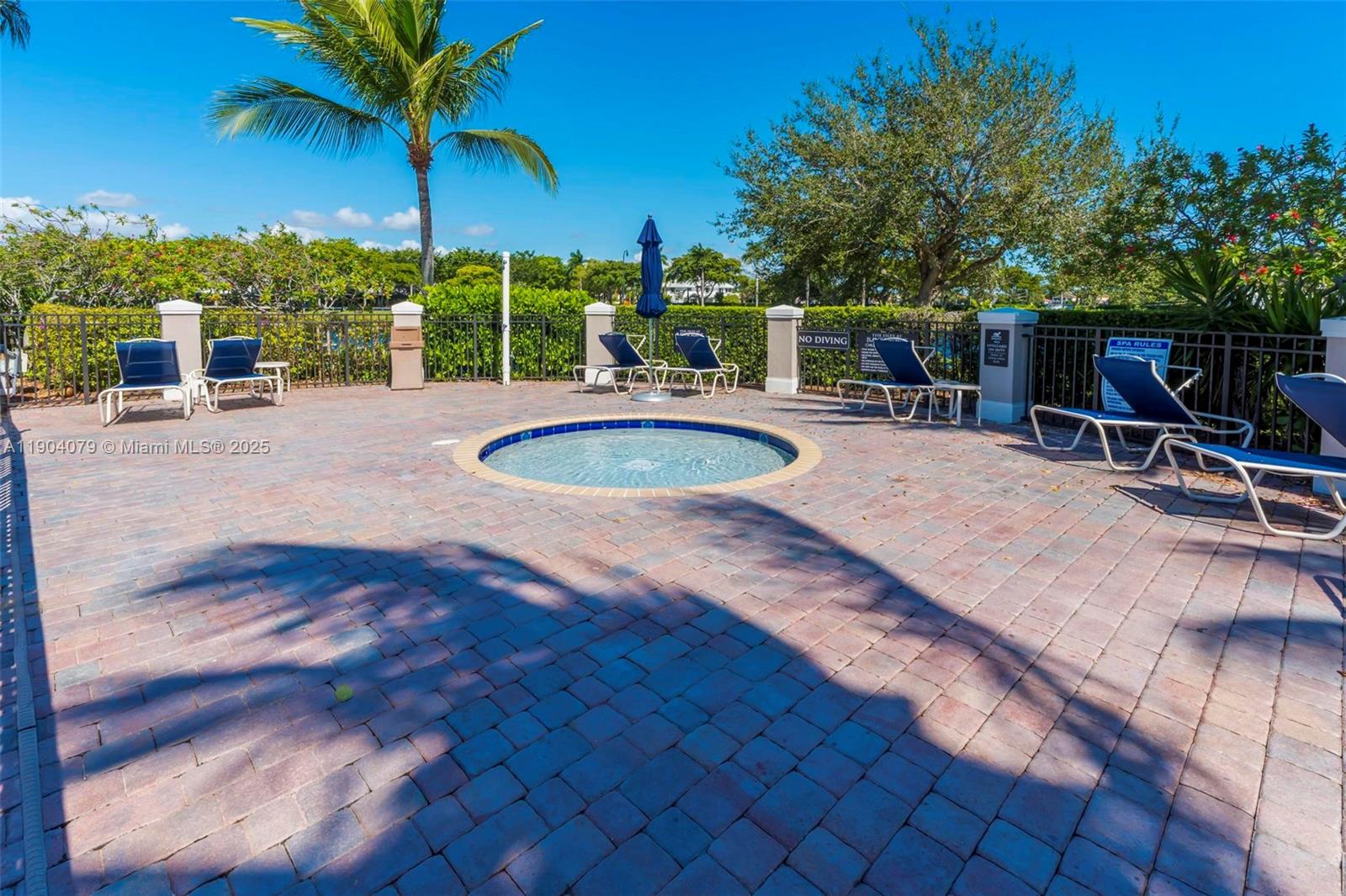 22232 Southwest 88th Path Cutler Bay, FL 33190 - Photo 51 of 72 a view of a swimming pool with a patio and a yard