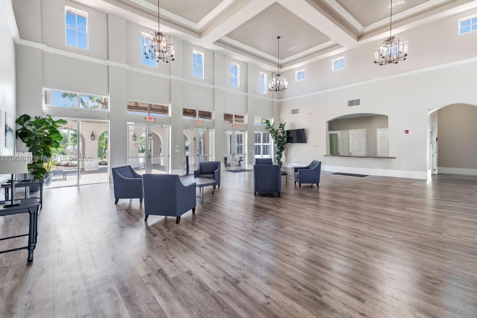 22232 Southwest 88th Path Cutler Bay, FL 33190 - Photo 55 of 72 a living room with furniture and a wooden floor