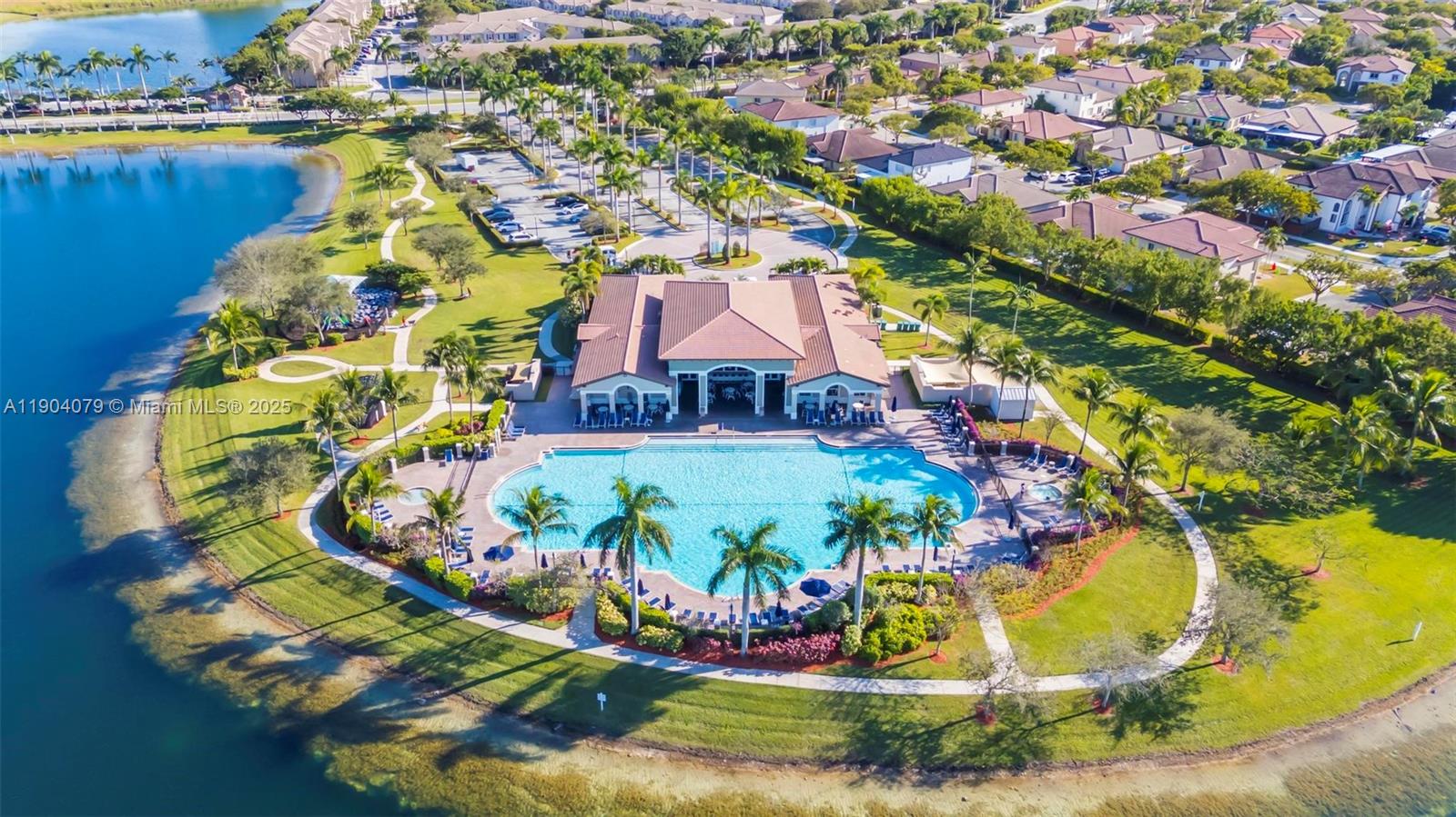 22232 Southwest 88th Path Cutler Bay, FL 33190 - Photo 68 of 72 an aerial view of a house with a swimming pool and outdoor seating
