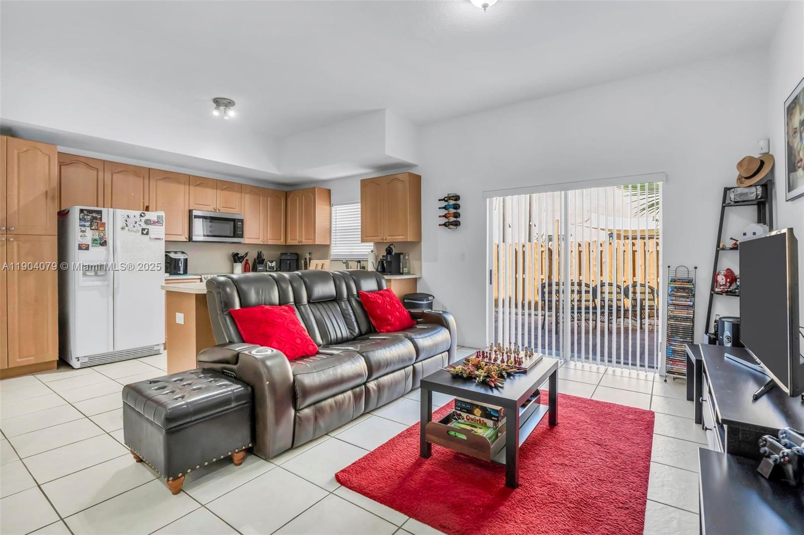 22232 Southwest 88th Path Cutler Bay, FL 33190 - Photo 7 of 72 a living room with furniture and a flat screen tv