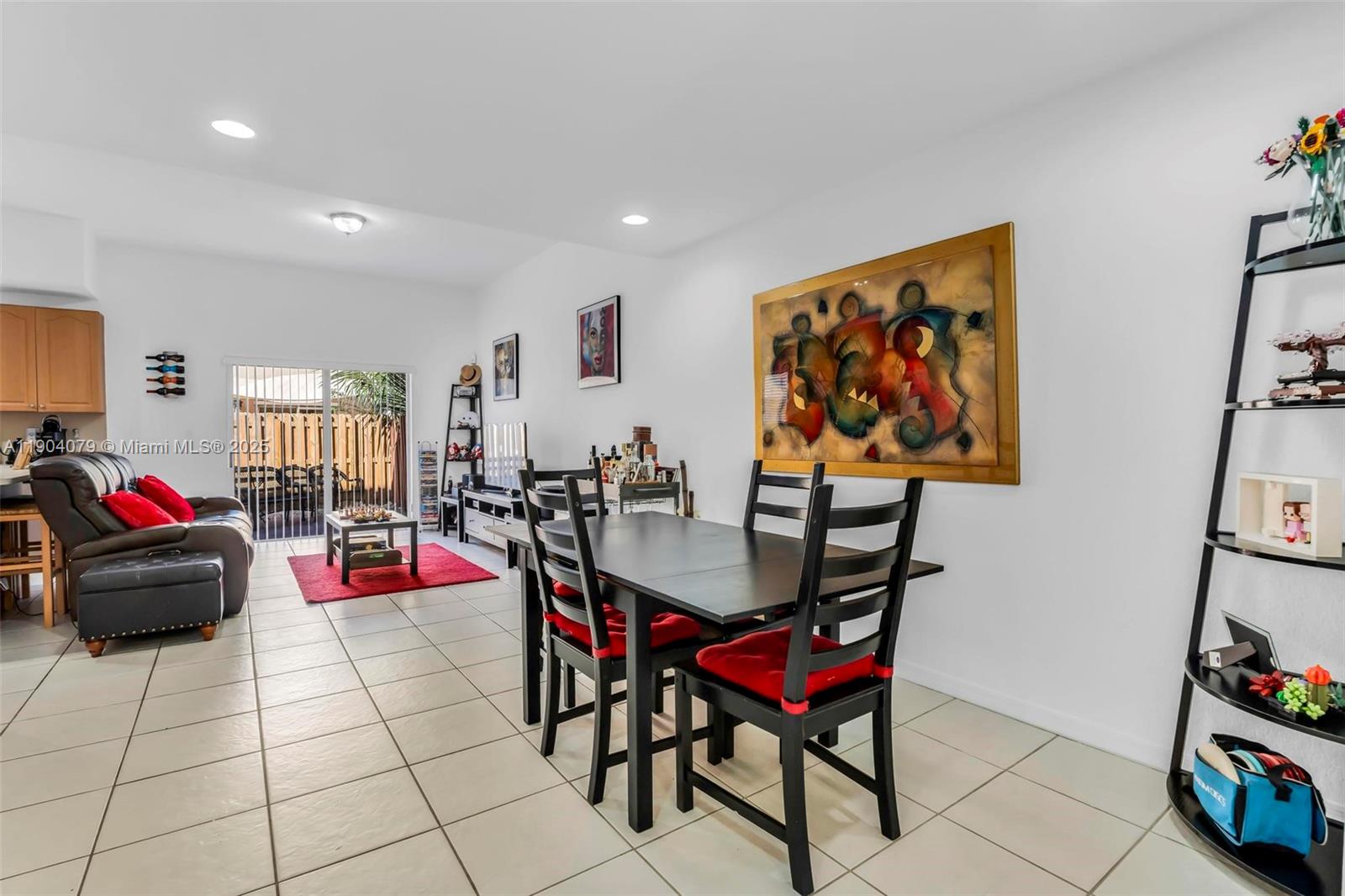 22232 Southwest 88th Path Cutler Bay, FL 33190 - Photo 10 of 72 a living room with furniture and a flat screen tv