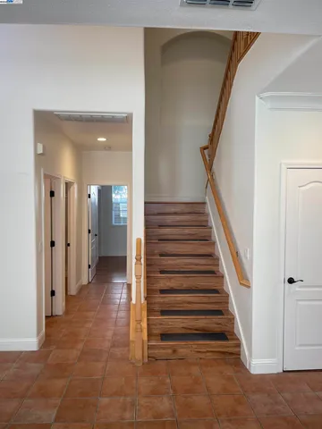 a view of a hallway with entryway