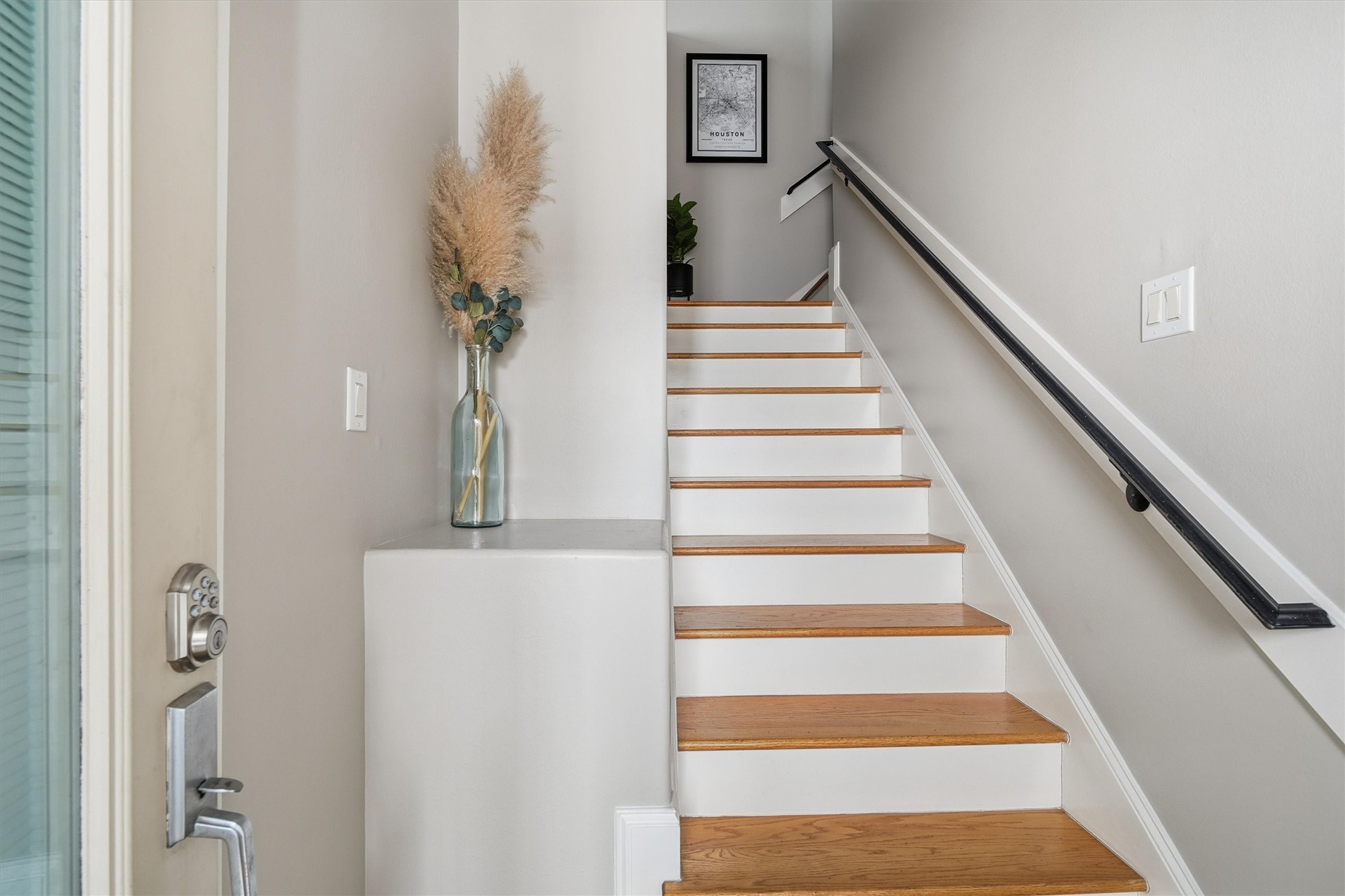 2529 Rusk Street Houston, TX 77003 - Photo 12 of 23 Welcoming entry with wood stairs and modern finishes