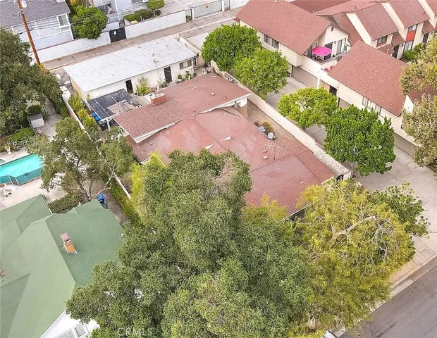 an aerial view of house with yard