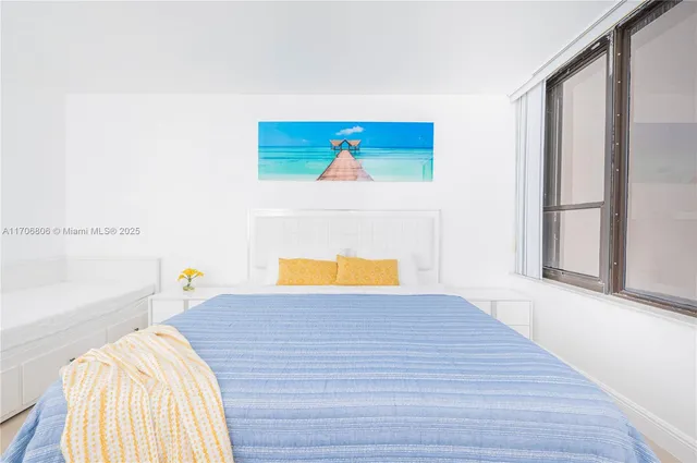 a view of a kitchen with wooden floor and a sink