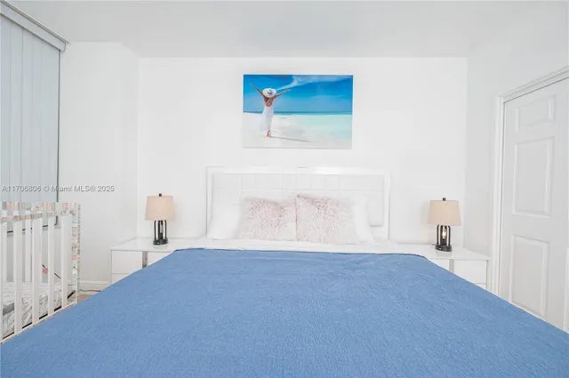 a bedroom with a bed and a cabinets