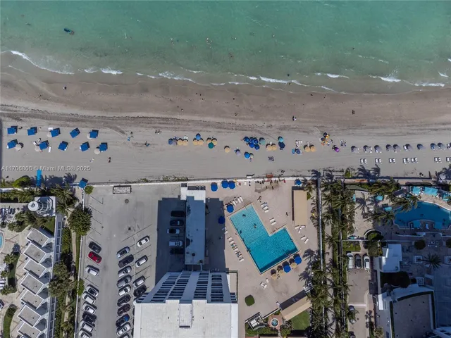 a front view of a building with a yard