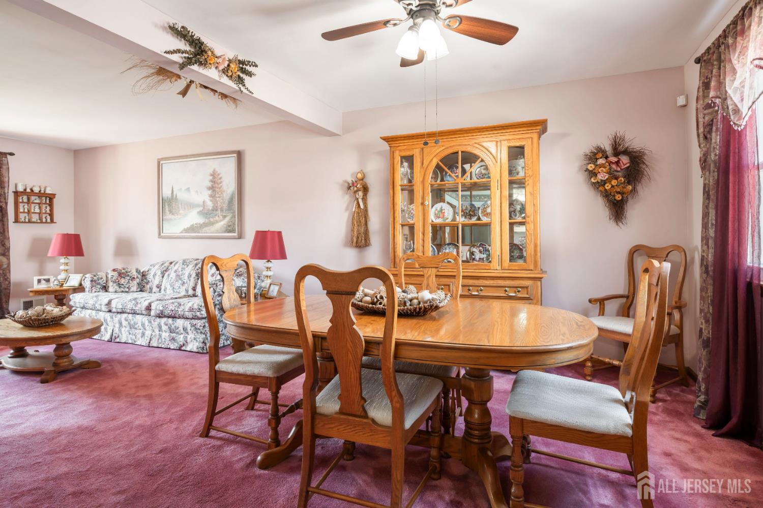 6 Marie Lane Edison, NJ 08817 - Photo 11 of 35 a dining room with furniture a chandelier and window