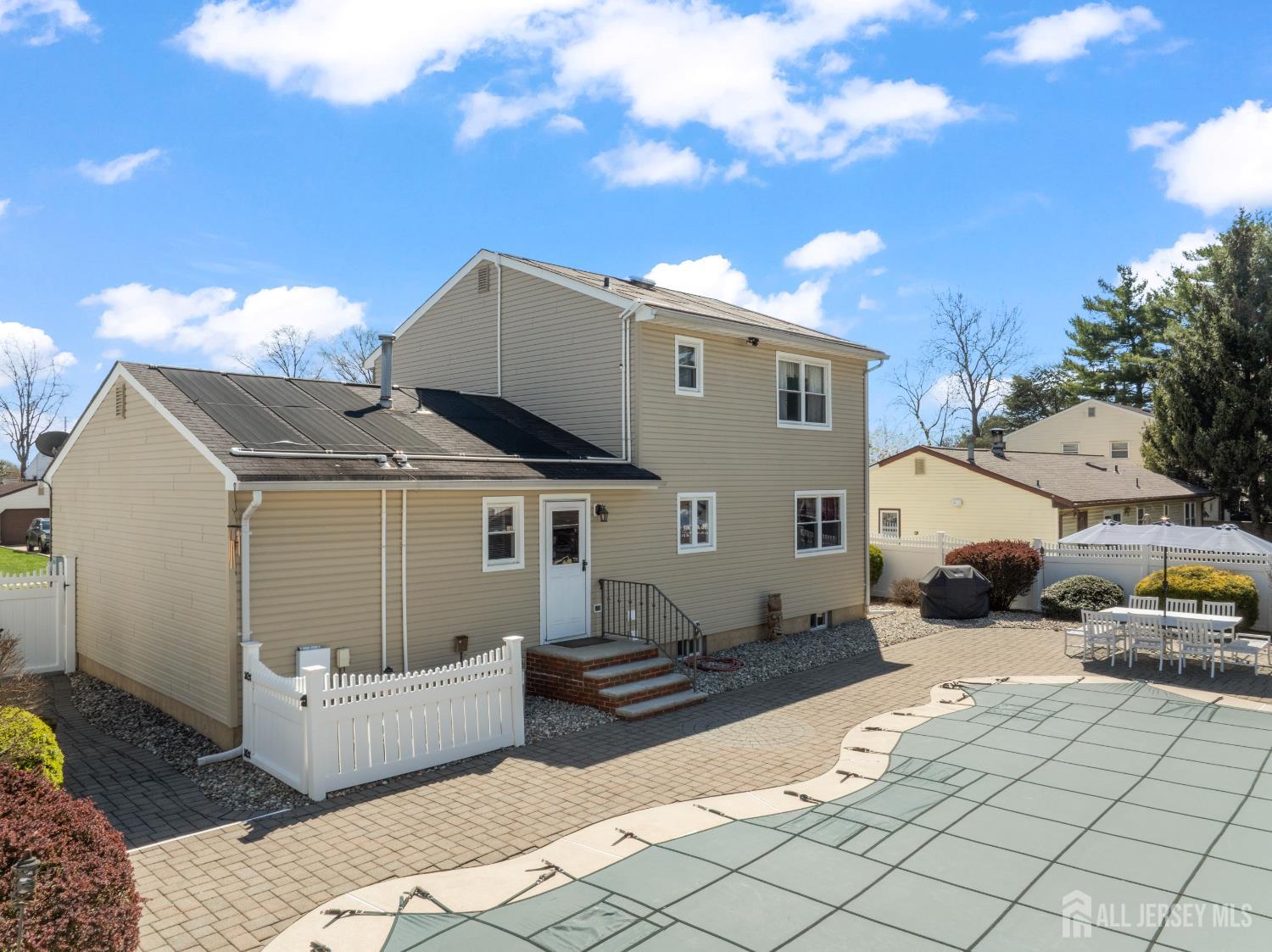 6 Marie Lane Edison, NJ 08817 - Photo 5 of 35 a front view of a house with cars parked