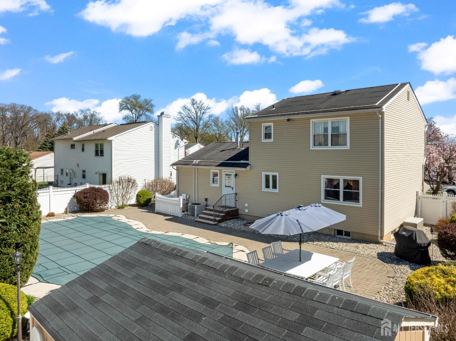 6 Marie Lane Edison, NJ 08817 - Photo 6 of 35 a view of a house with backyard and sitting area
