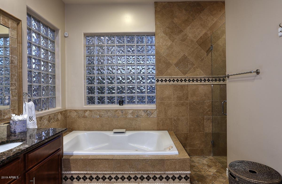 3736 East Maffeo Road Phoenix, AZ 85050 - Photo 23 of 62 a bathroom with a bathtub