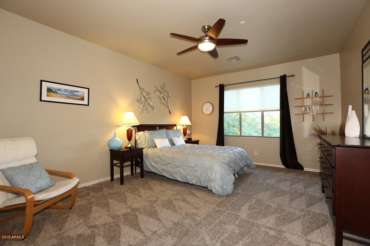 3736 East Maffeo Road Phoenix, AZ 85050 - Photo 33 of 62 a bedroom with a bed and window