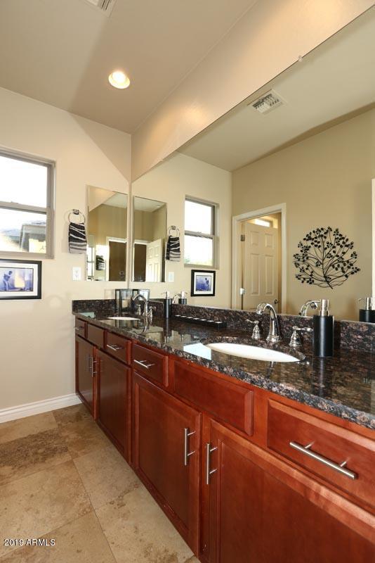 3736 East Maffeo Road Phoenix, AZ 85050 - Photo 34 of 62 a kitchen with sink and cabinets