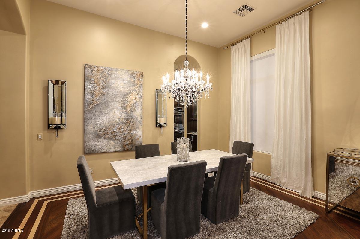 3736 East Maffeo Road Phoenix, AZ 85050 - Photo 6 of 62 a dining room with furniture and window
