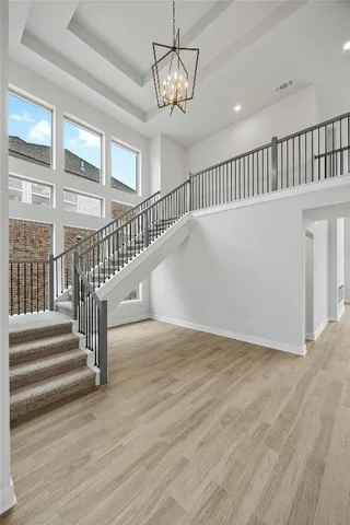 a view of entryway with wooden floor
