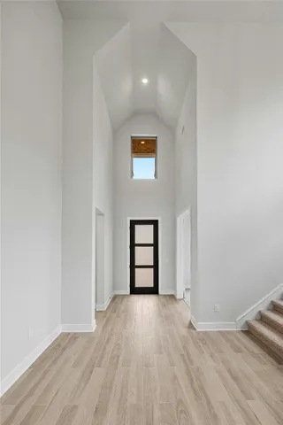 wooden floor and a window in a room