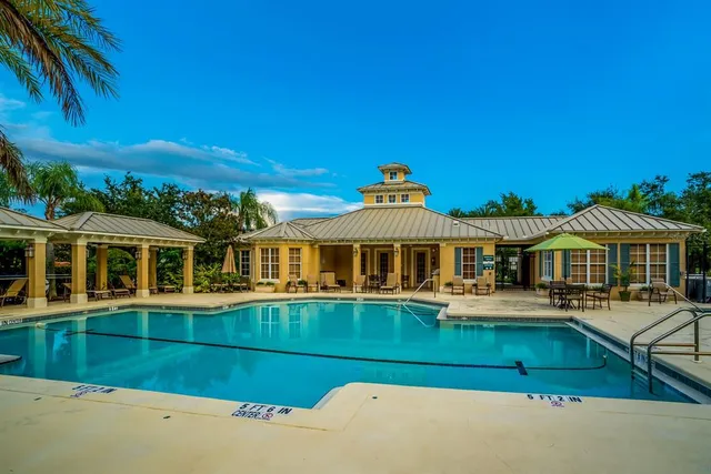 a view of swimming pool with a patio