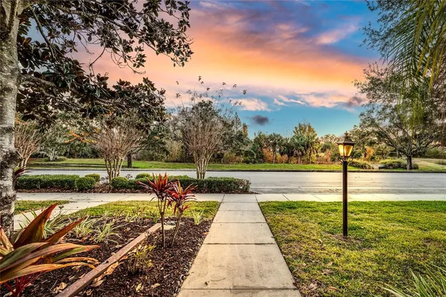 a view of a lake with a yard
