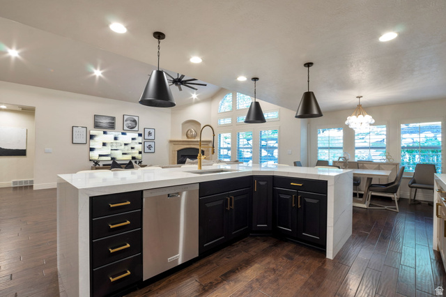 577 South Ridge Top Lane East North Salt Lake, UT 84054 - Photo 8 of 57 The impressive waterfall island serves as the centerpiece of this beautifully updated kitchen, perfect for entertaining.
