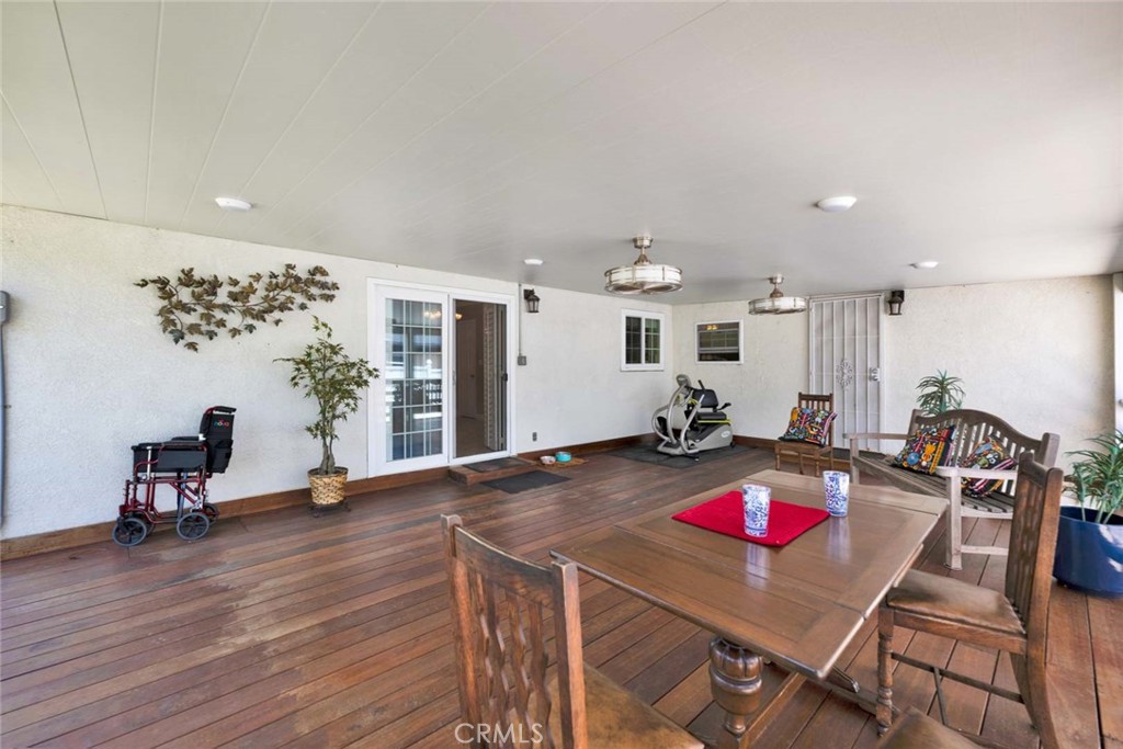 5456 Cadbury Road Whittier, CA 90601 - Photo 51 of 67 a living room with furniture and wooden floor