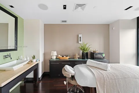 a view of a room with a floor to ceiling window and floor to ceiling window