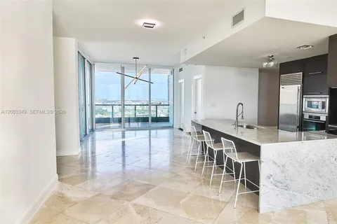a room with lots of table and chair