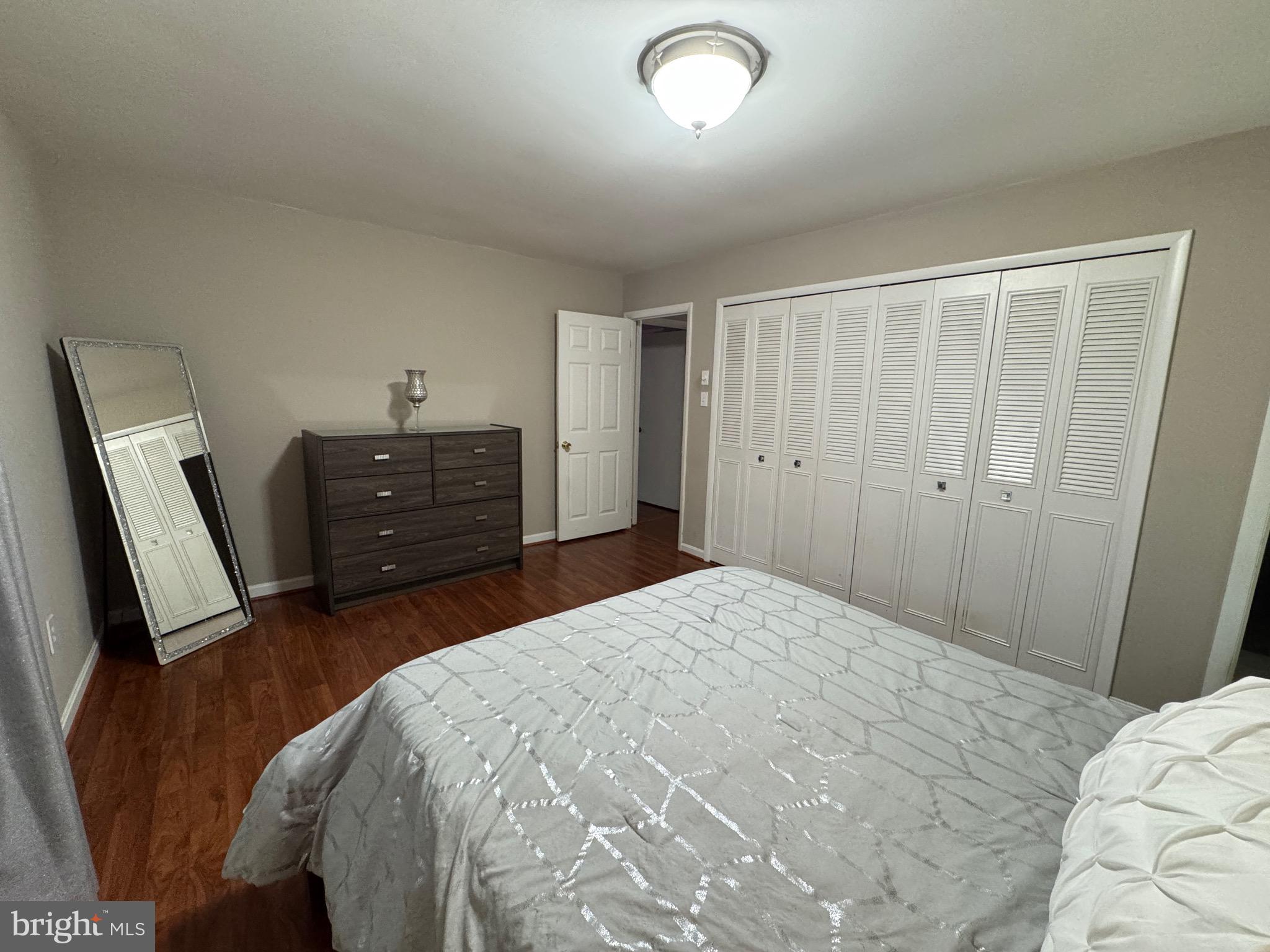 13030 Maple View Lane Fairfax, VA 22033 - Photo 14 of 30 a bedroom with a bed and a dresser
