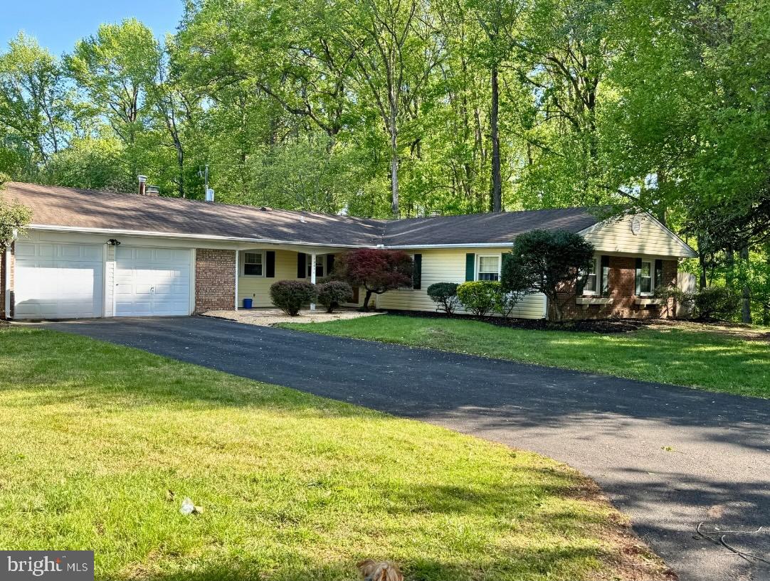 13030 Maple View Lane Fairfax, VA 22033 - Photo 28 of 30 a view of house with a yard