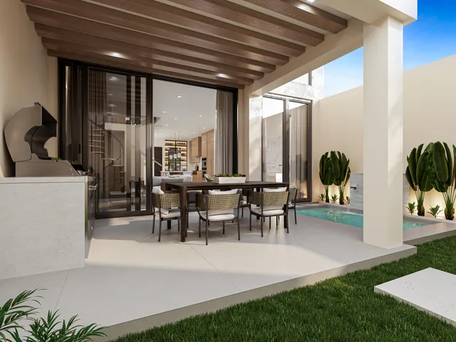 a view of a porch with chairs and backyard