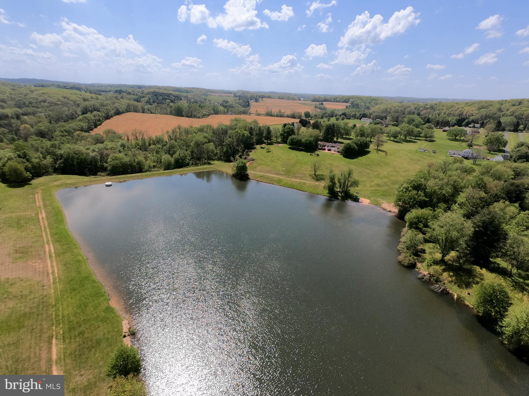 1162 Ridge Road Pylesville, MD 21132 - Photo 48 of 49 Enjoy a stocked lake with a beach.