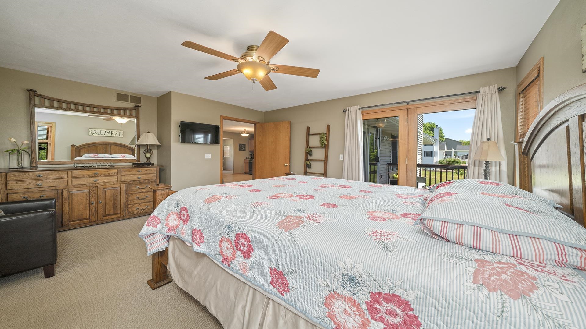4317 Ridgeview Lane Byron, IL 61010 - Photo 17 of 41 a bedroom with a large bed and a large window