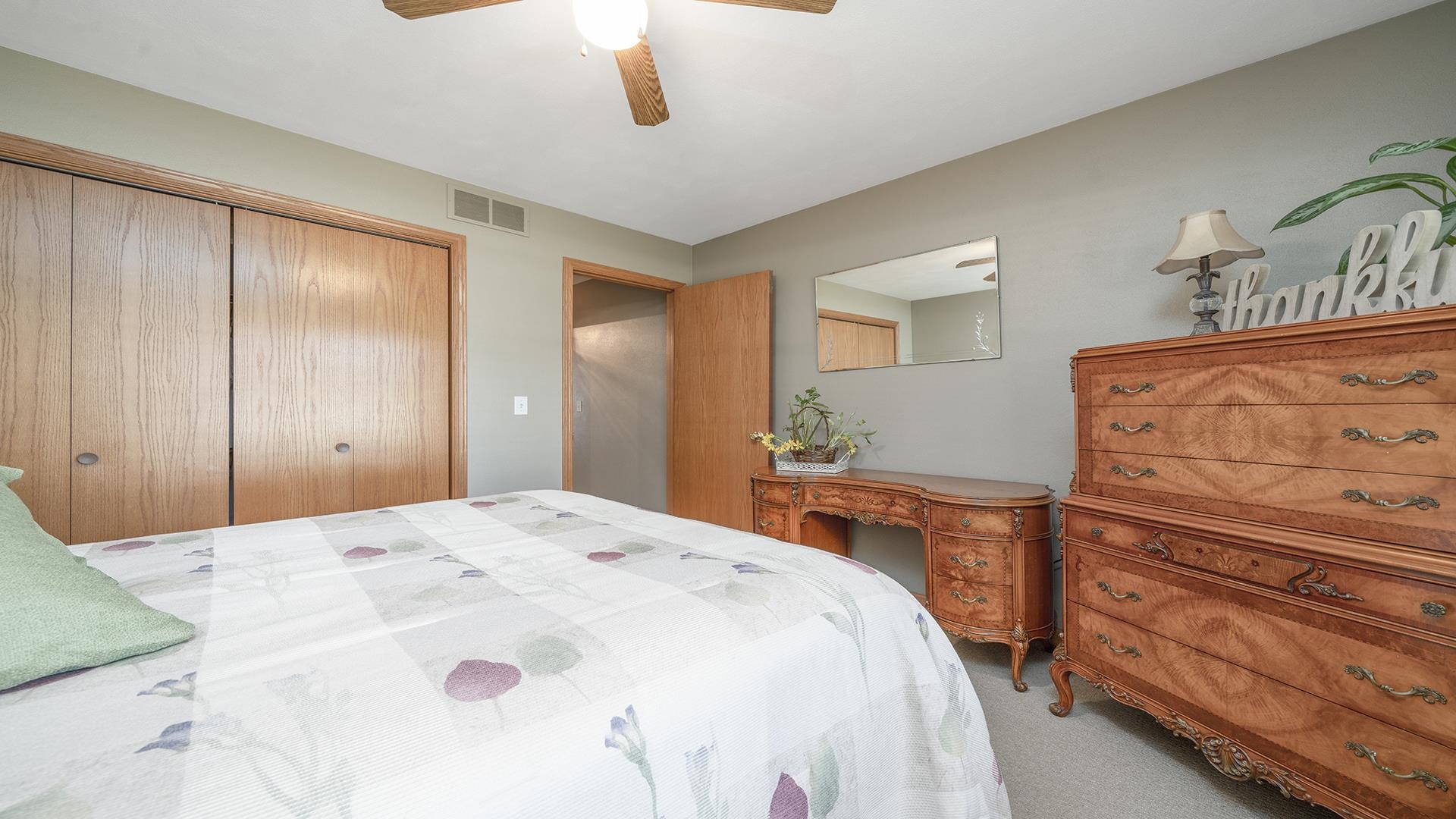 4317 Ridgeview Lane Byron, IL 61010 - Photo 23 of 41 a spacious bedroom with a bed and a dresser