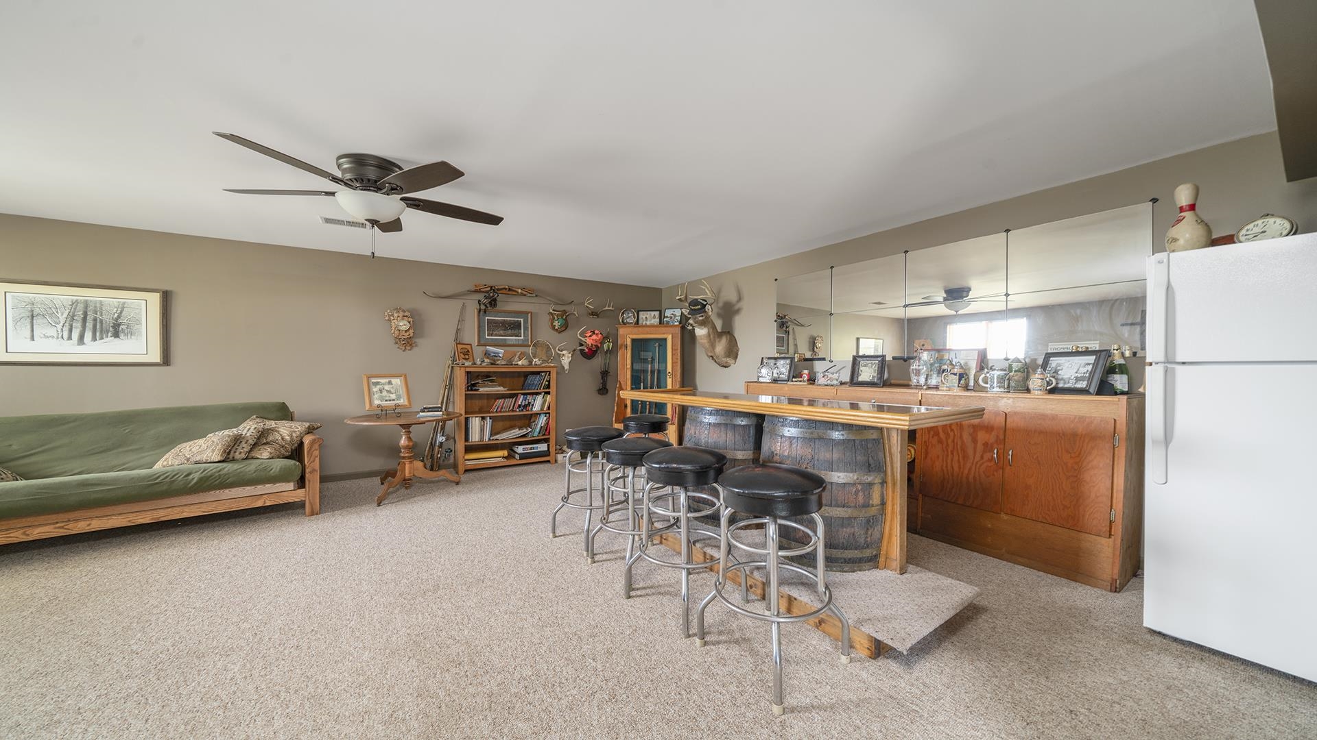 4317 Ridgeview Lane Byron, IL 61010 - Photo 26 of 41 a living room with furniture and kitchen view