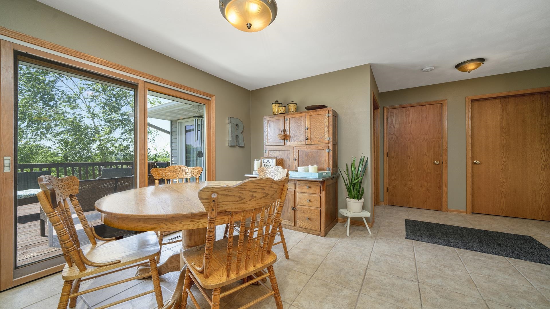 4317 Ridgeview Lane Byron, IL 61010 - Photo 8 of 41 a view of a dining room with furniture and chandelier