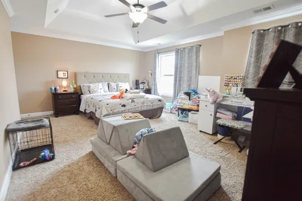 a living room with furniture and a window