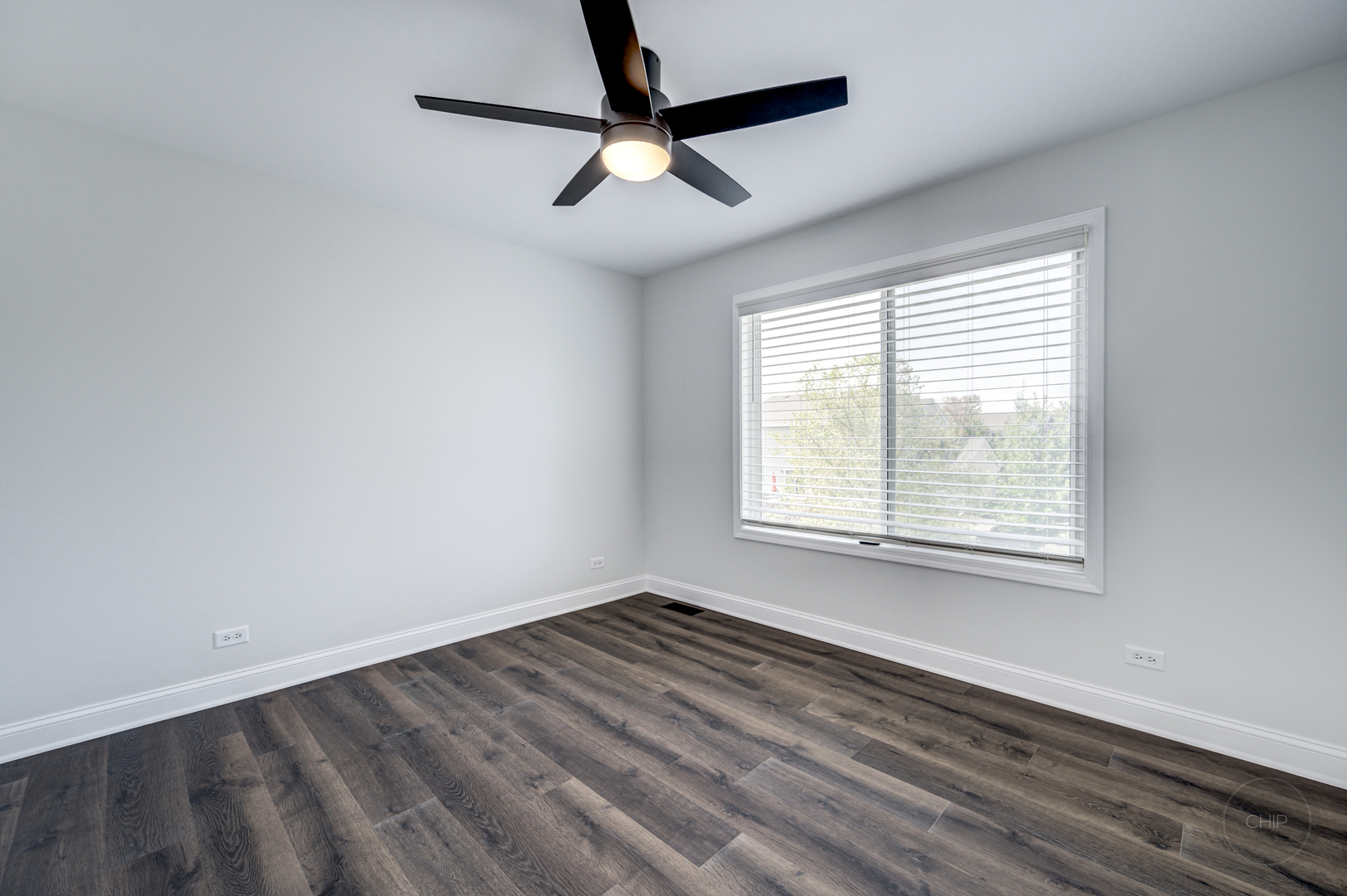 12948 Parterre Place Plainfield, IL 60585 - Photo 30 of 35 a view of an empty room with a window