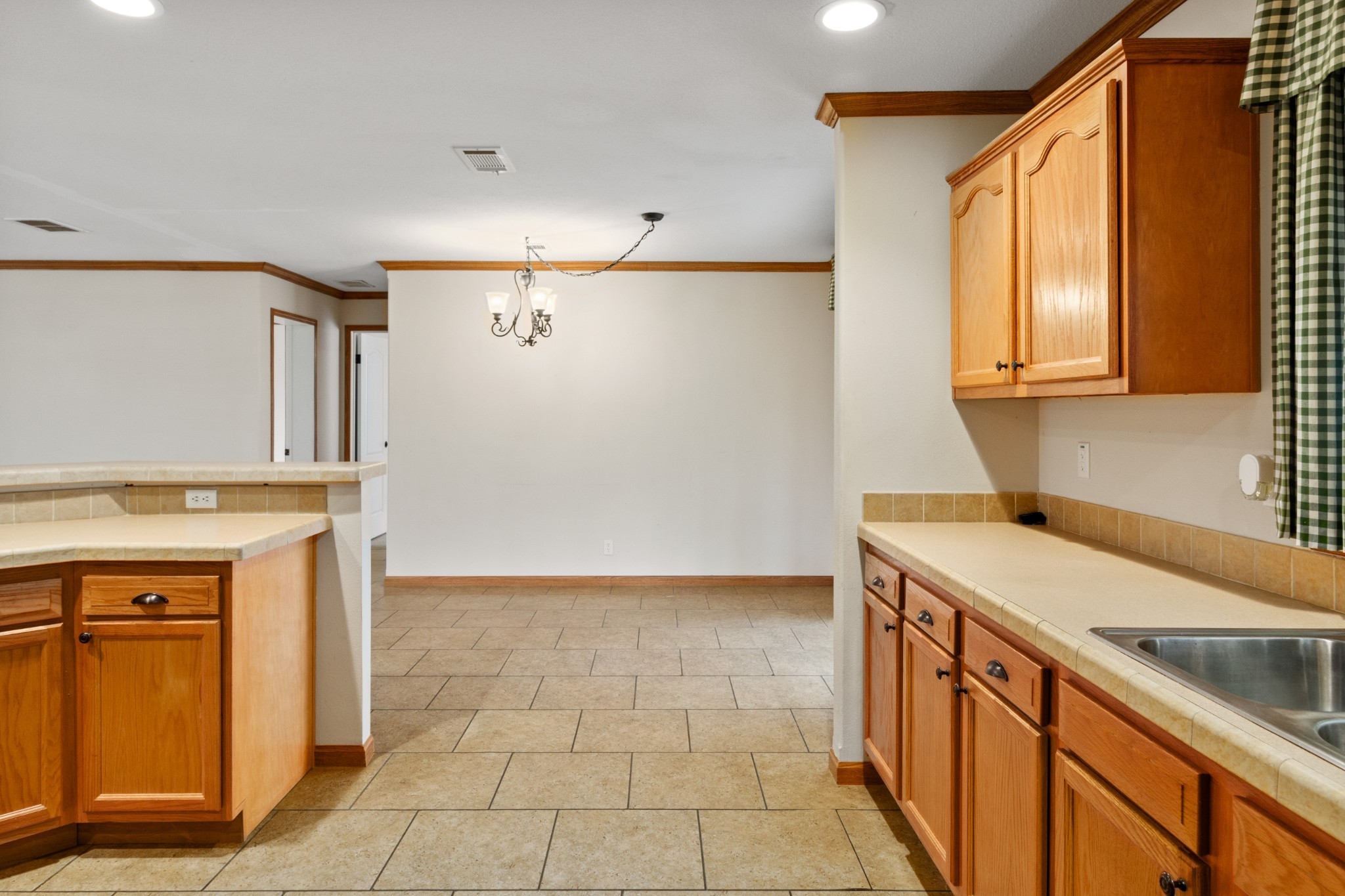 5147 Spears Road Centerville, TN 37033 - Photo 20 of 40 a kitchen that has a sink and a stove in it
