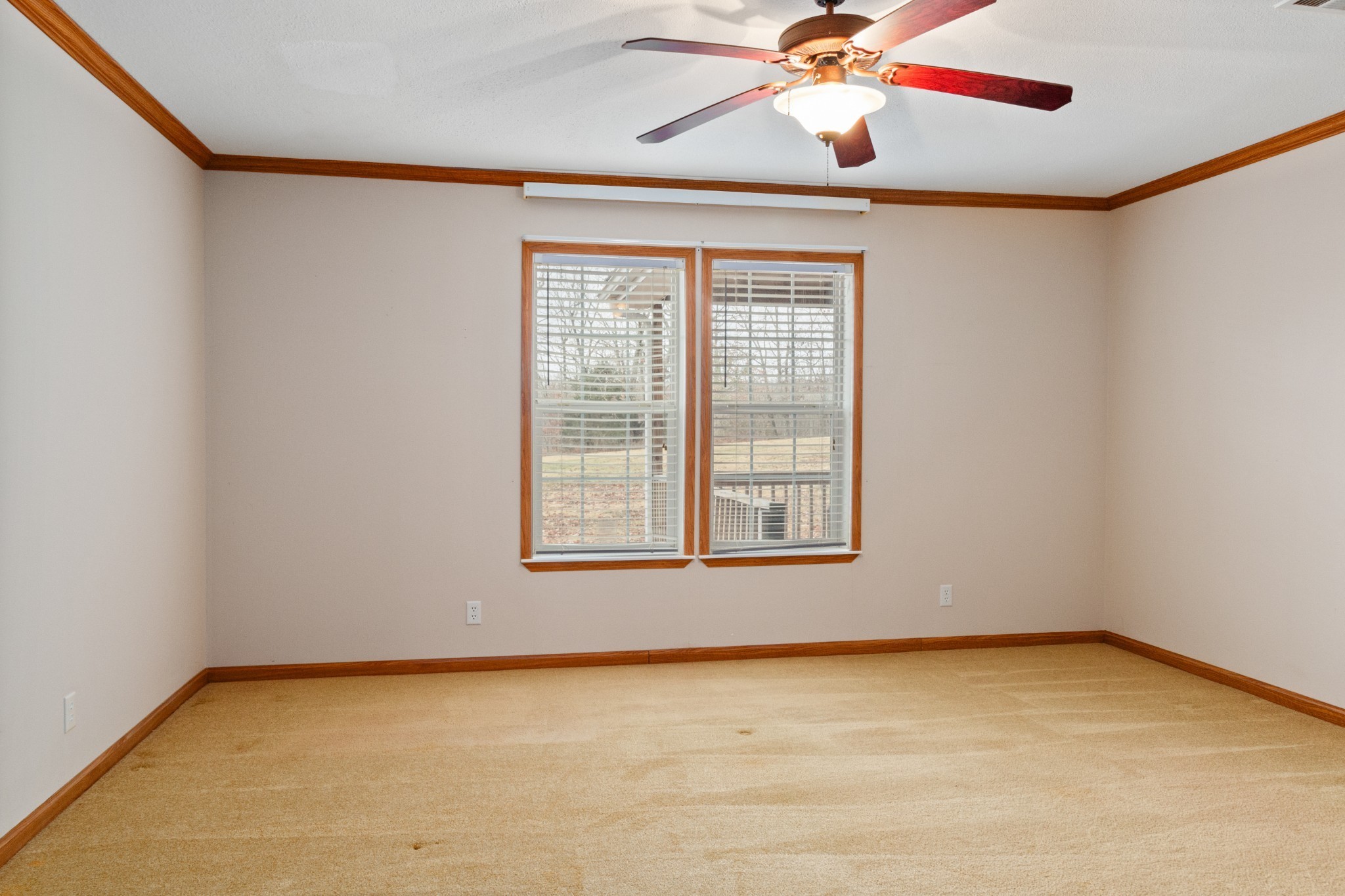 5147 Spears Road Centerville, TN 37033 - Photo 22 of 40 an empty room with a window and a ceiling fan