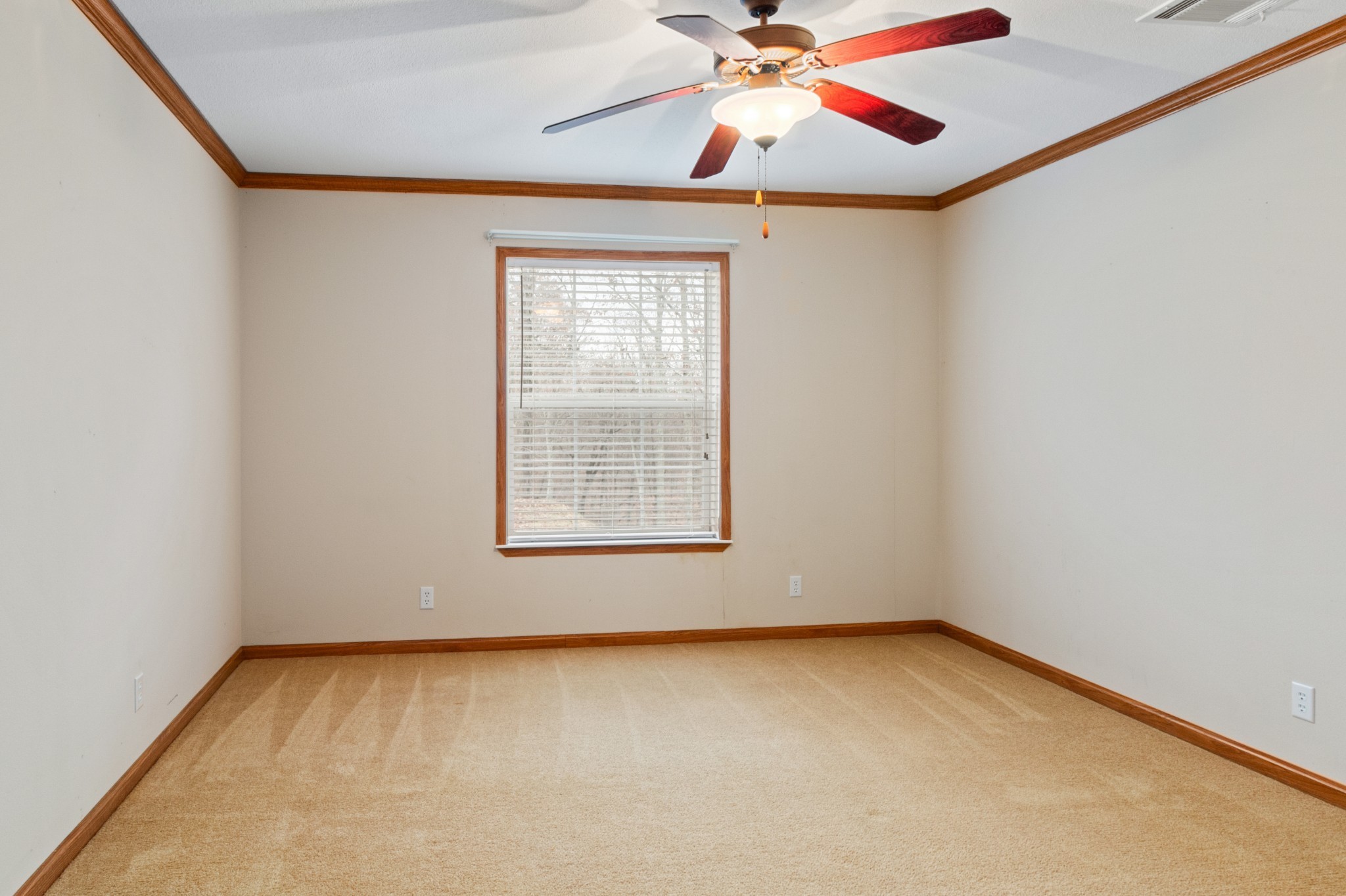 5147 Spears Road Centerville, TN 37033 - Photo 26 of 40 an empty room with a window and a ceiling fan