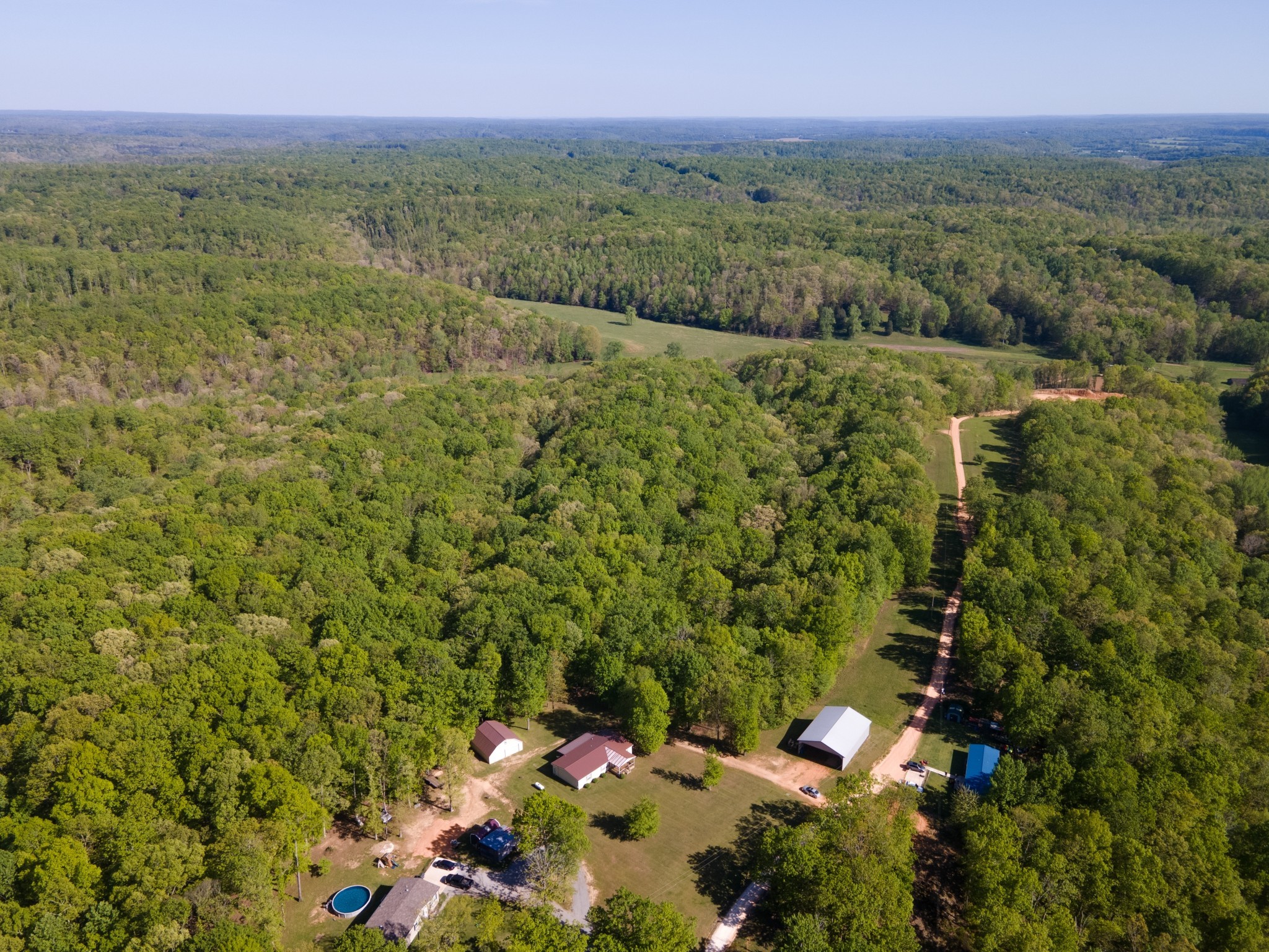 5147 Spears Road Centerville, TN 37033 - Photo 30 of 40 a view of a city with lush green forest