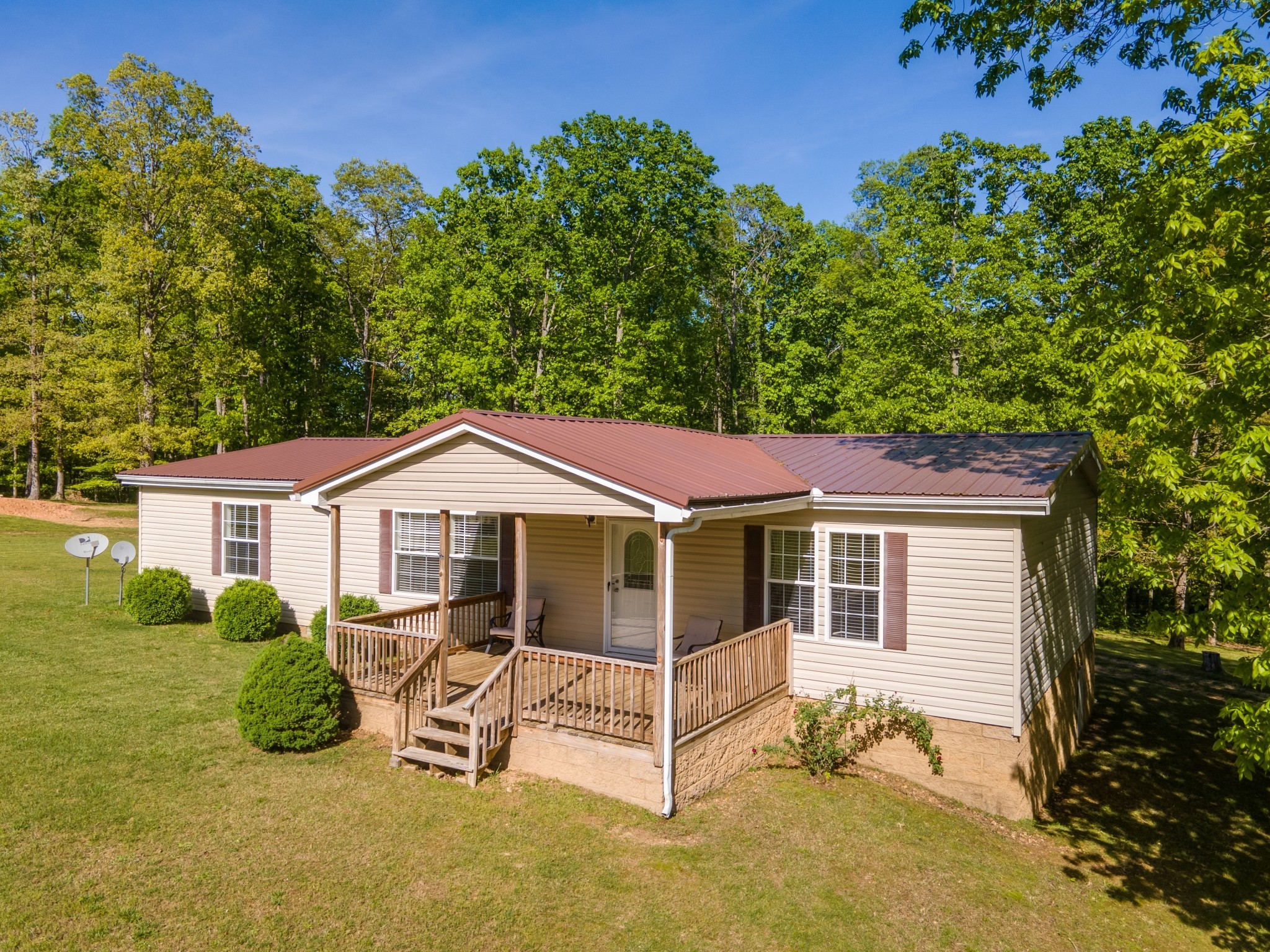 5147 Spears Road Centerville, TN 37033 - Photo 3 of 40 a view of a house with a yard and sitting area