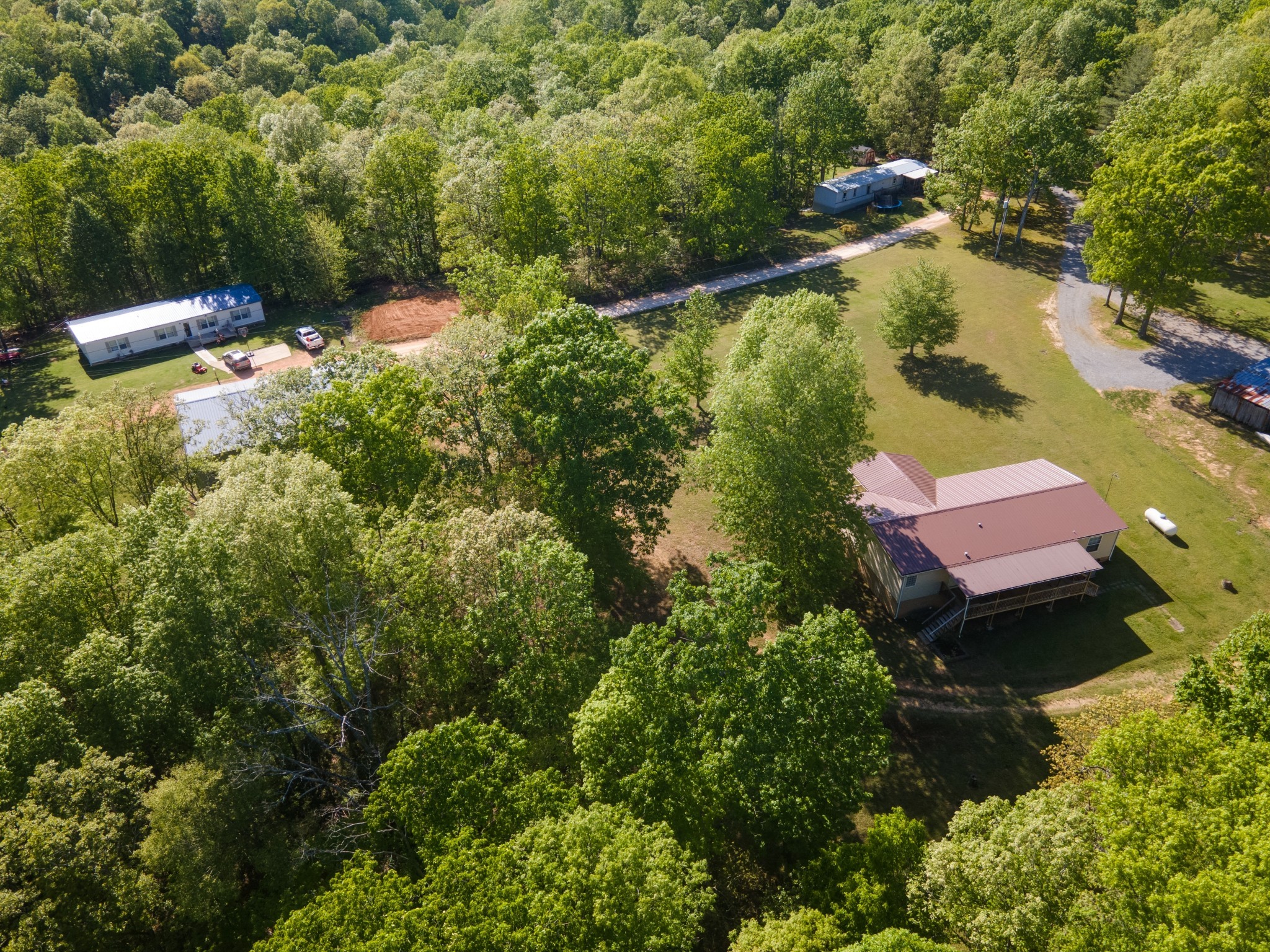 5147 Spears Road Centerville, TN 37033 - Photo 32 of 40 an aerial view of residential house with outdoor space and trees all around