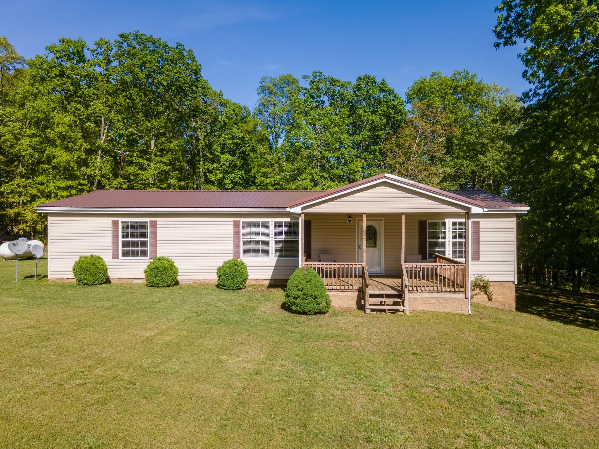 5147 Spears Road Centerville, TN 37033 - Photo 4 of 40 a front view of a house with garden